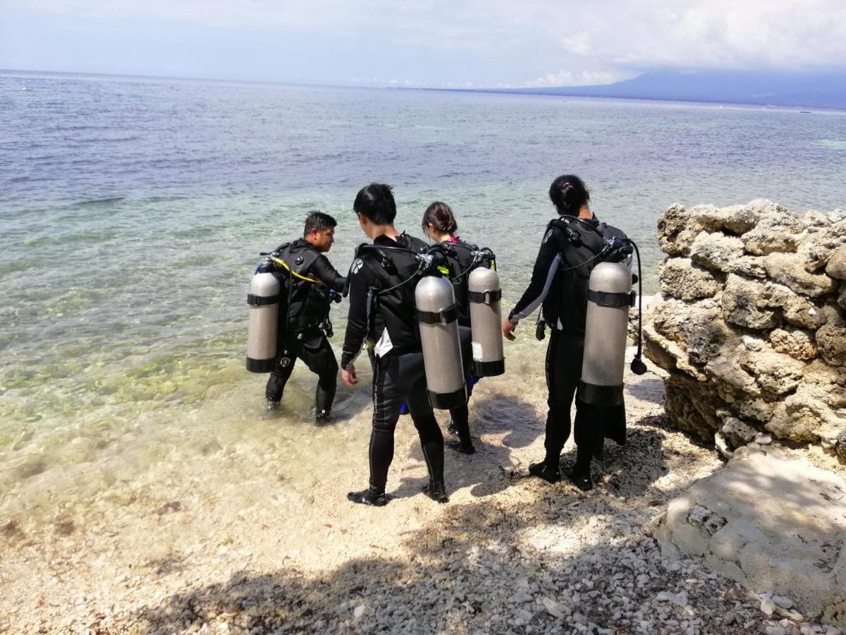 Southseas Beach Resort And Dive Center Santander Buitenkant foto