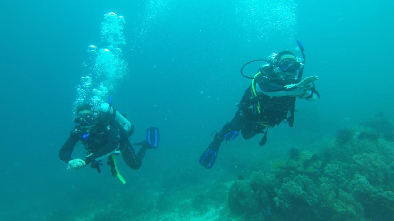 Southseas Beach Resort And Dive Center Santander Buitenkant foto