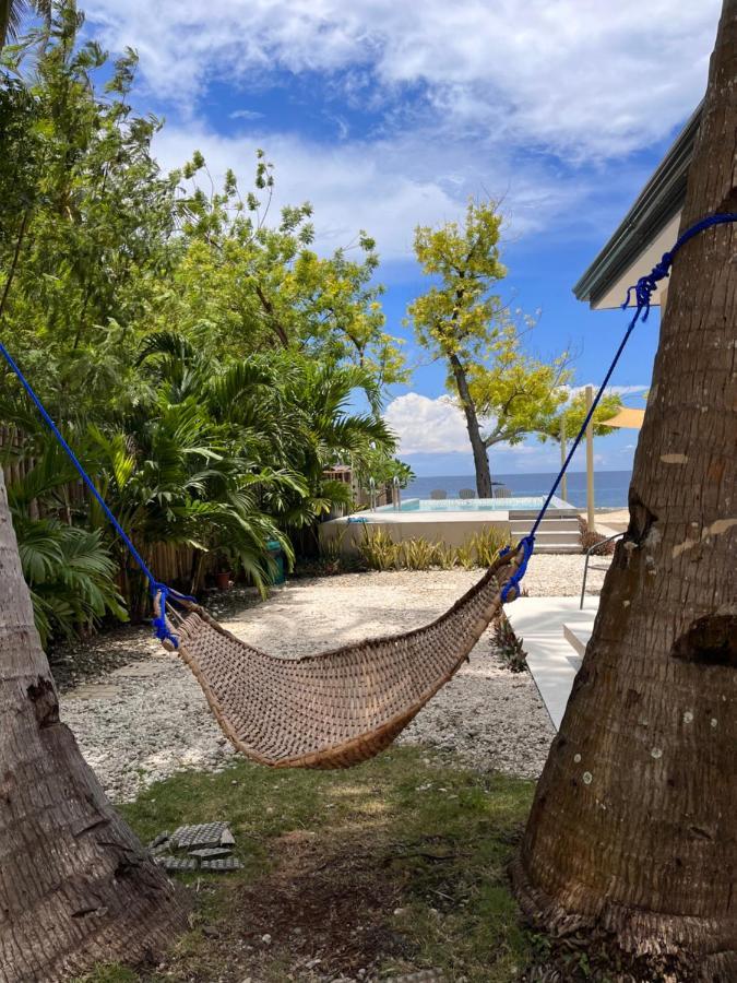 Southseas Beach Resort And Dive Center Santander Buitenkant foto