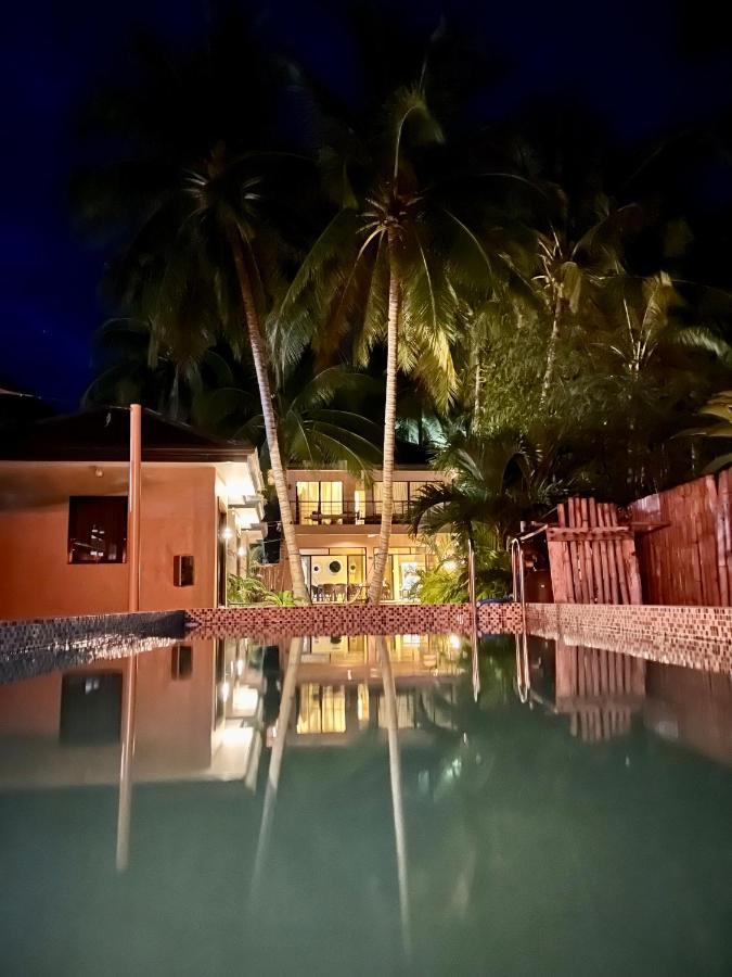 Southseas Beach Resort And Dive Center Santander Buitenkant foto