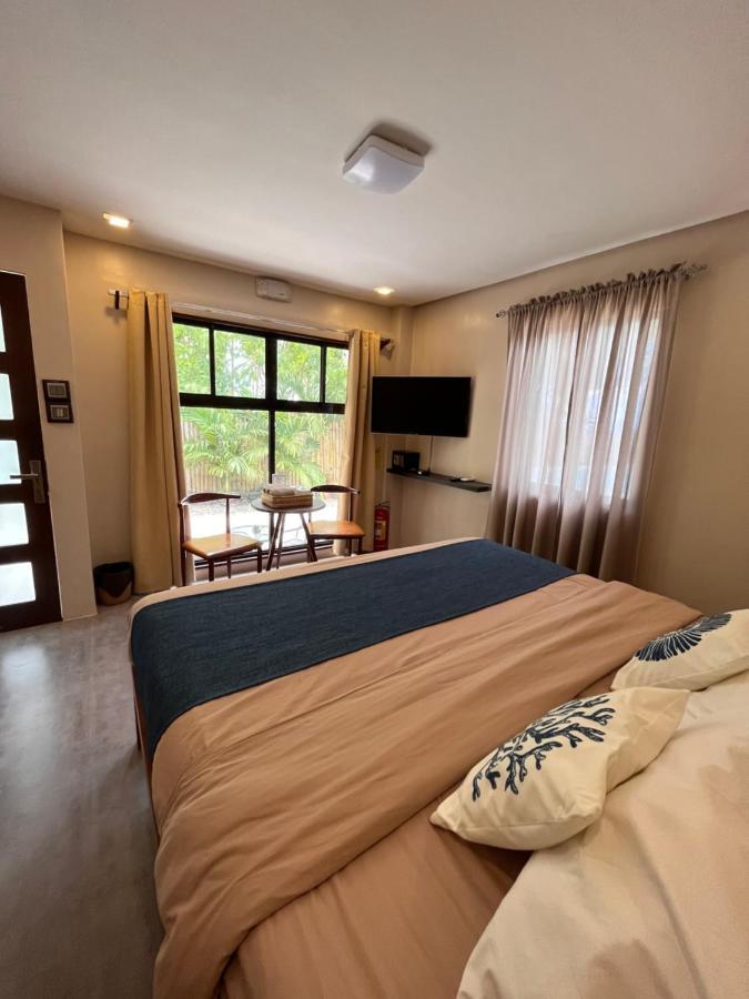 Southseas Beach Resort And Dive Center Santander Buitenkant foto