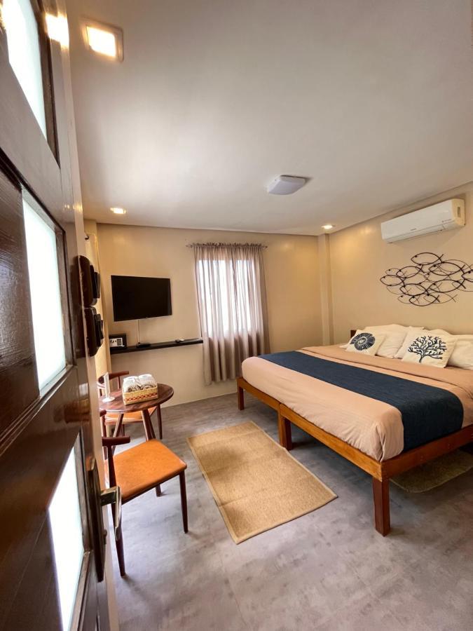 Southseas Beach Resort And Dive Center Santander Buitenkant foto