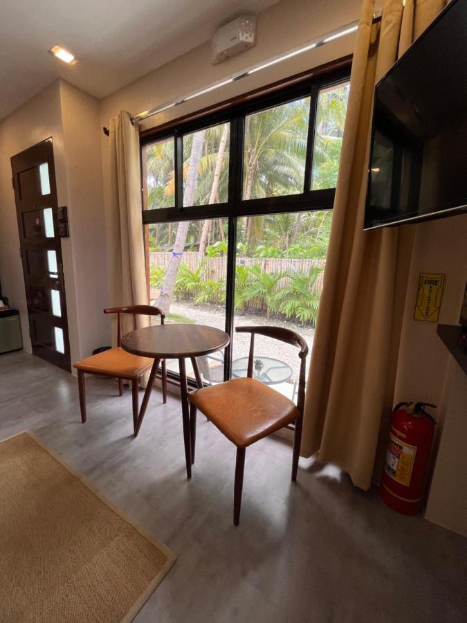 Southseas Beach Resort And Dive Center Santander Buitenkant foto
