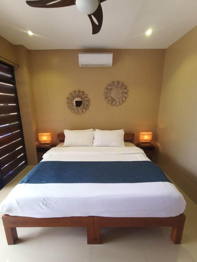 Southseas Beach Resort And Dive Center Santander Buitenkant foto