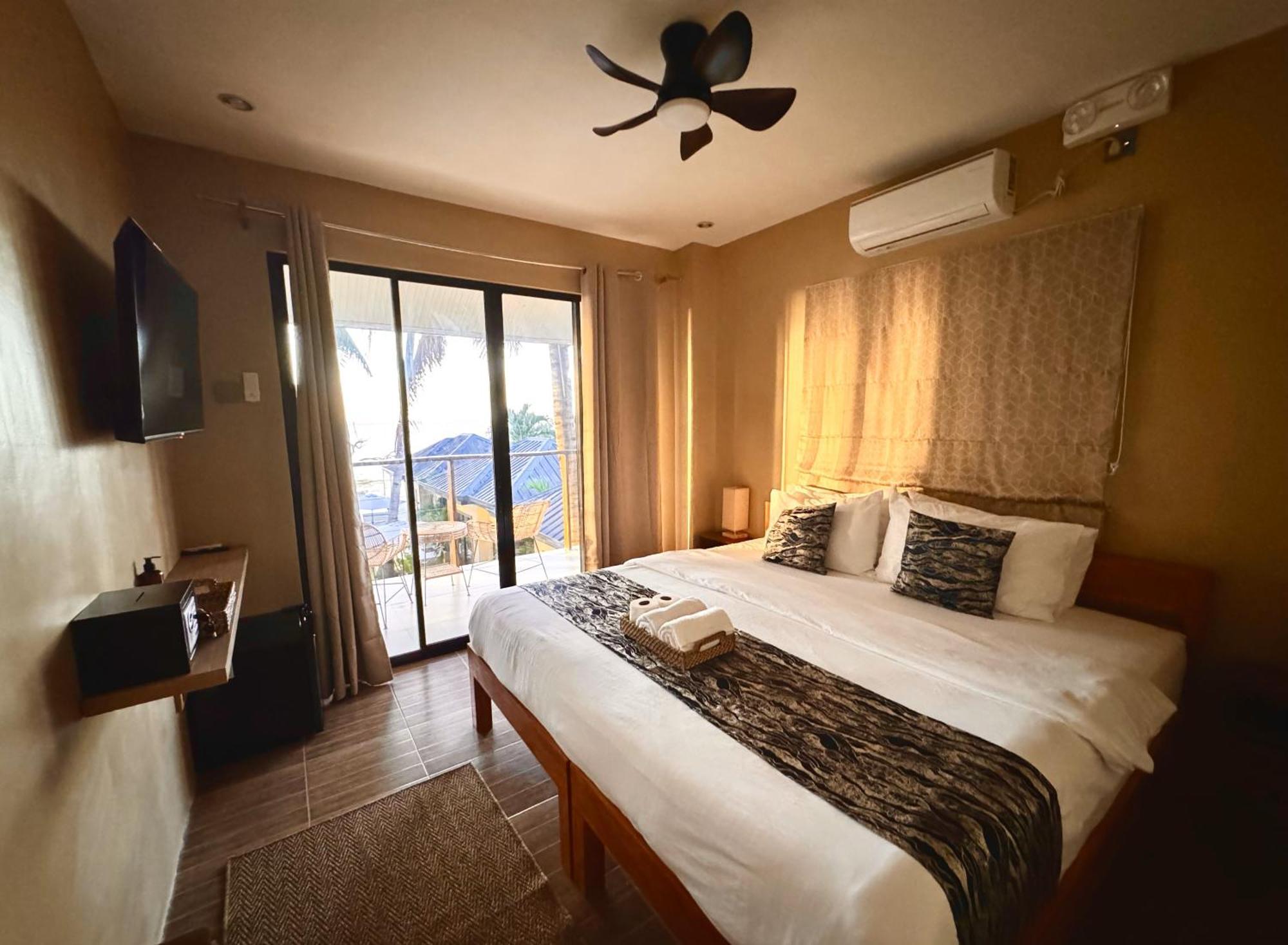 Southseas Beach Resort And Dive Center Santander Buitenkant foto