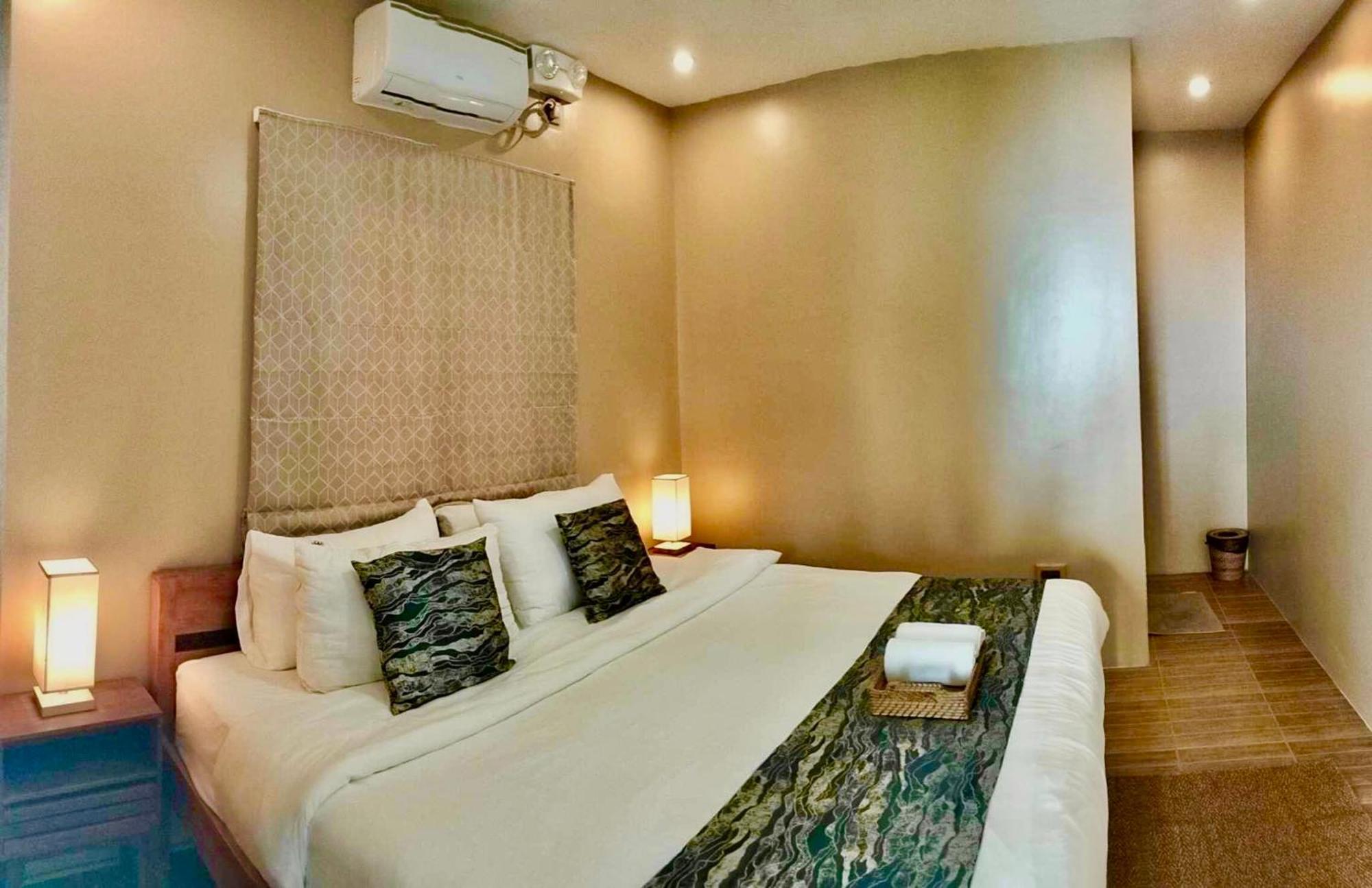 Southseas Beach Resort And Dive Center Santander Buitenkant foto