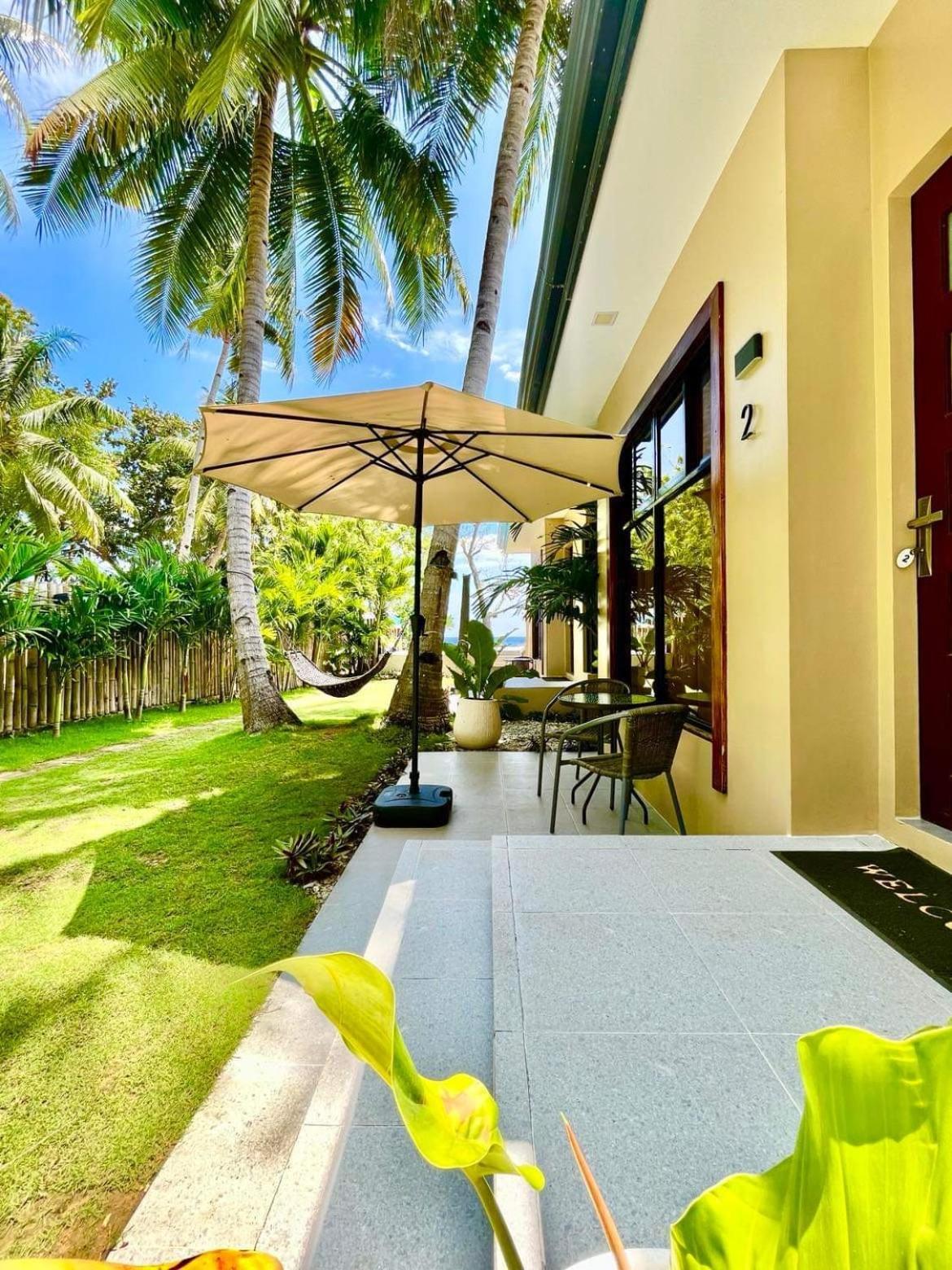 Southseas Beach Resort And Dive Center Santander Buitenkant foto